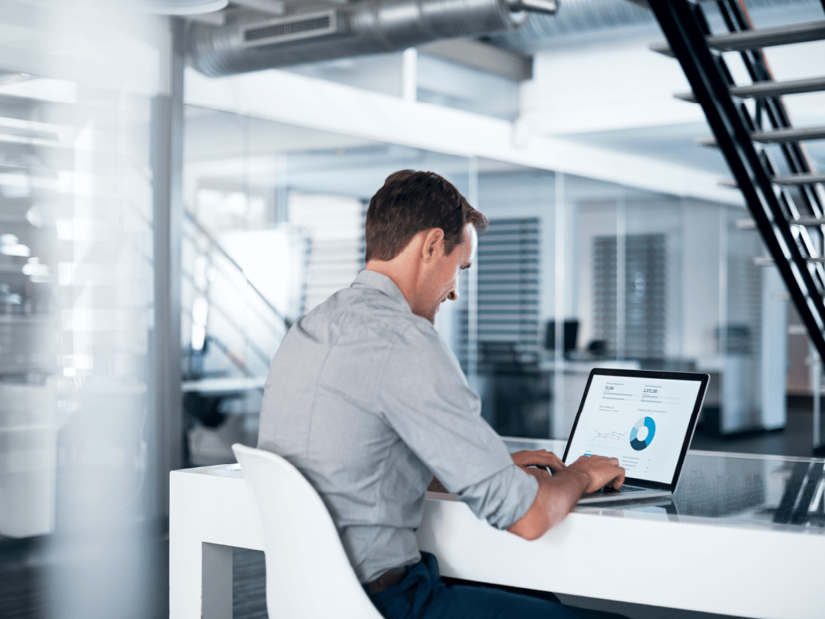 man on laptop in office